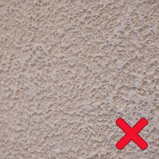 Closeup for a bad wall surface choice to place the Aurrca premium metal magnetic poster mounting on
